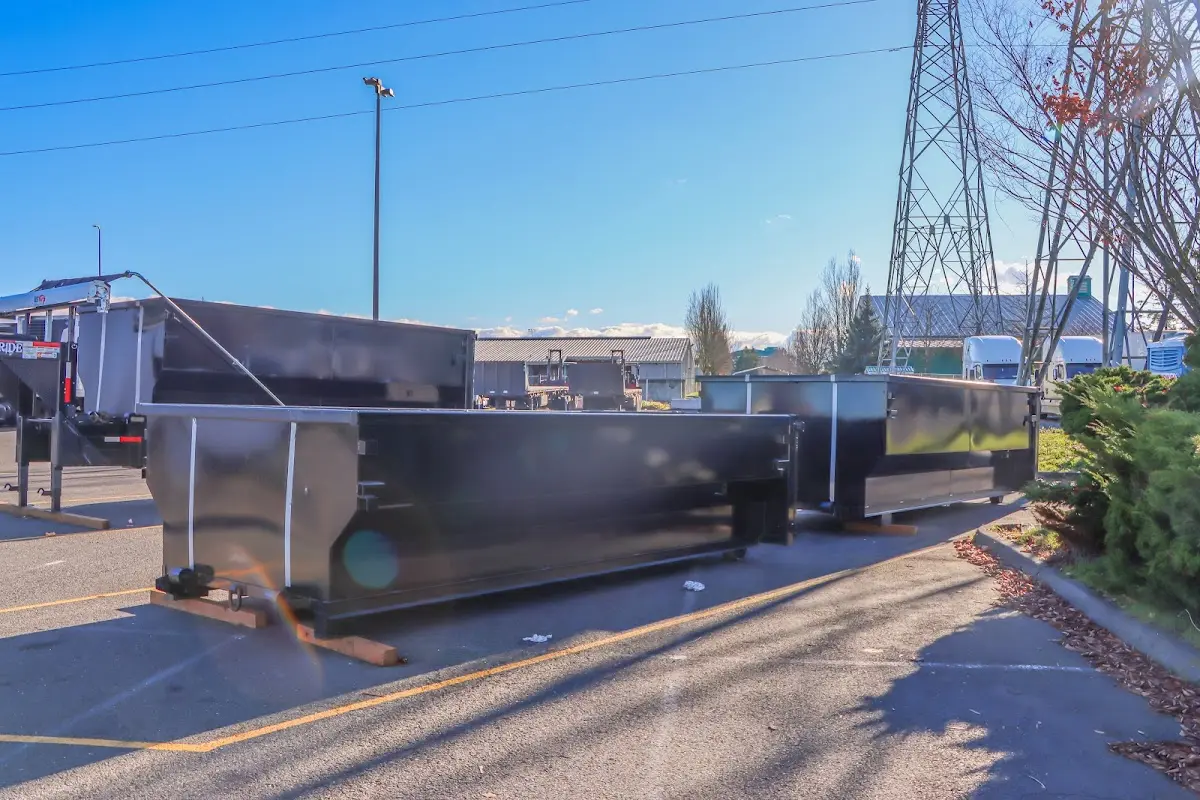 Roll-off dumpster ready for waste disposal at job site for Construction Dumpster Rental in Valley Stream